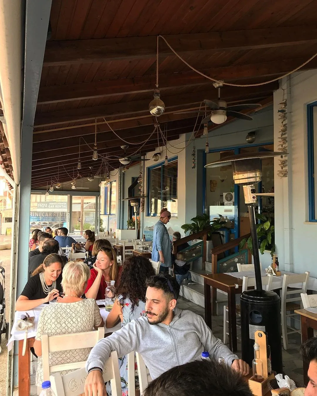 A seafront fish taverna terrace in Nea Chora, Chania